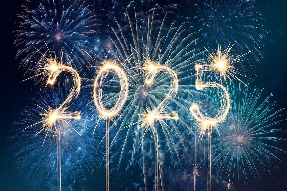 Sparklers forming "2025" with fireworks background