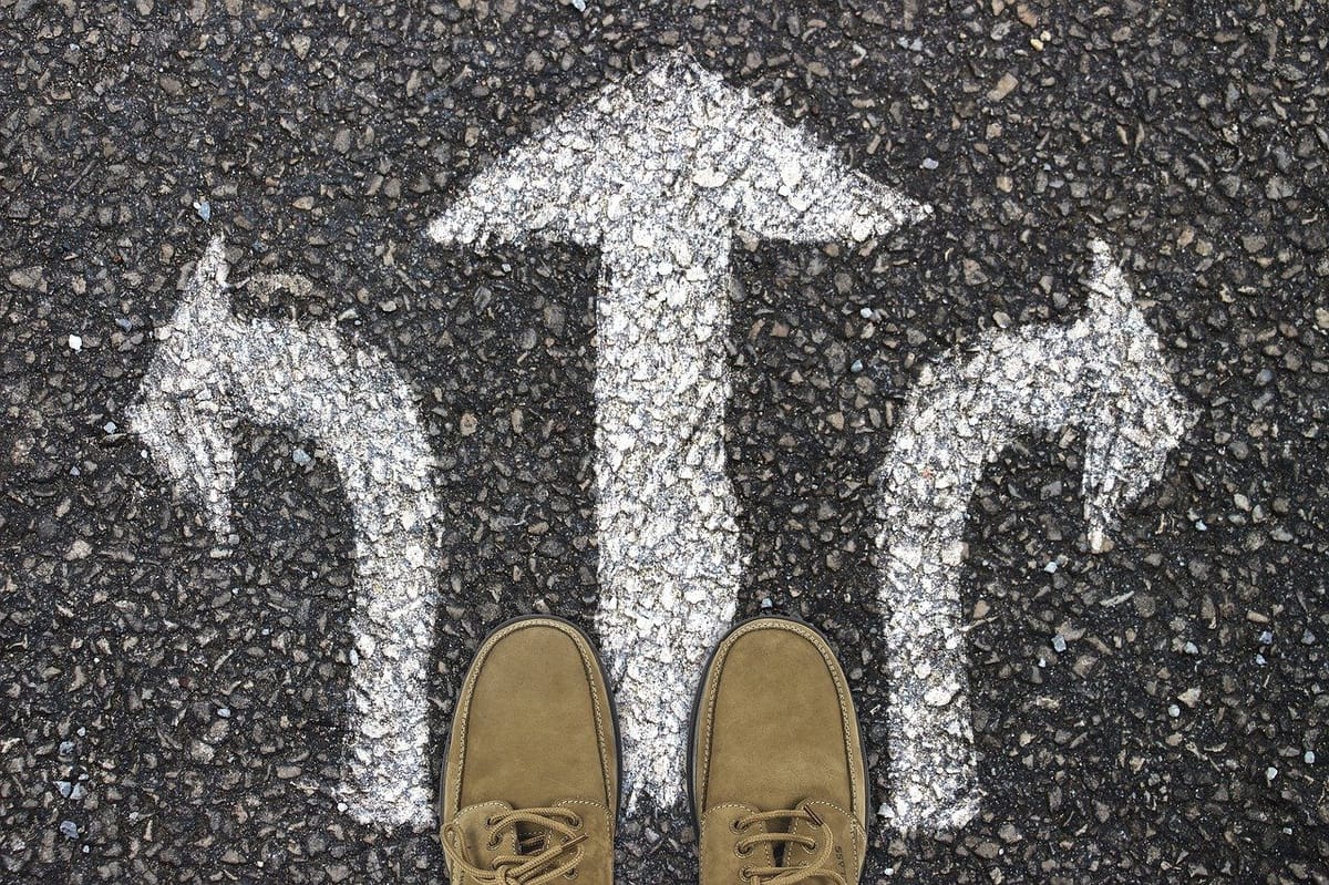 Feet at intersection of three arrows.