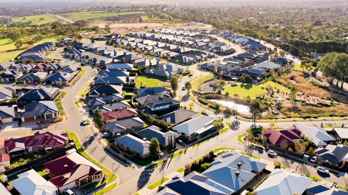 Aerial view of a suburban neighborhood with many houses.