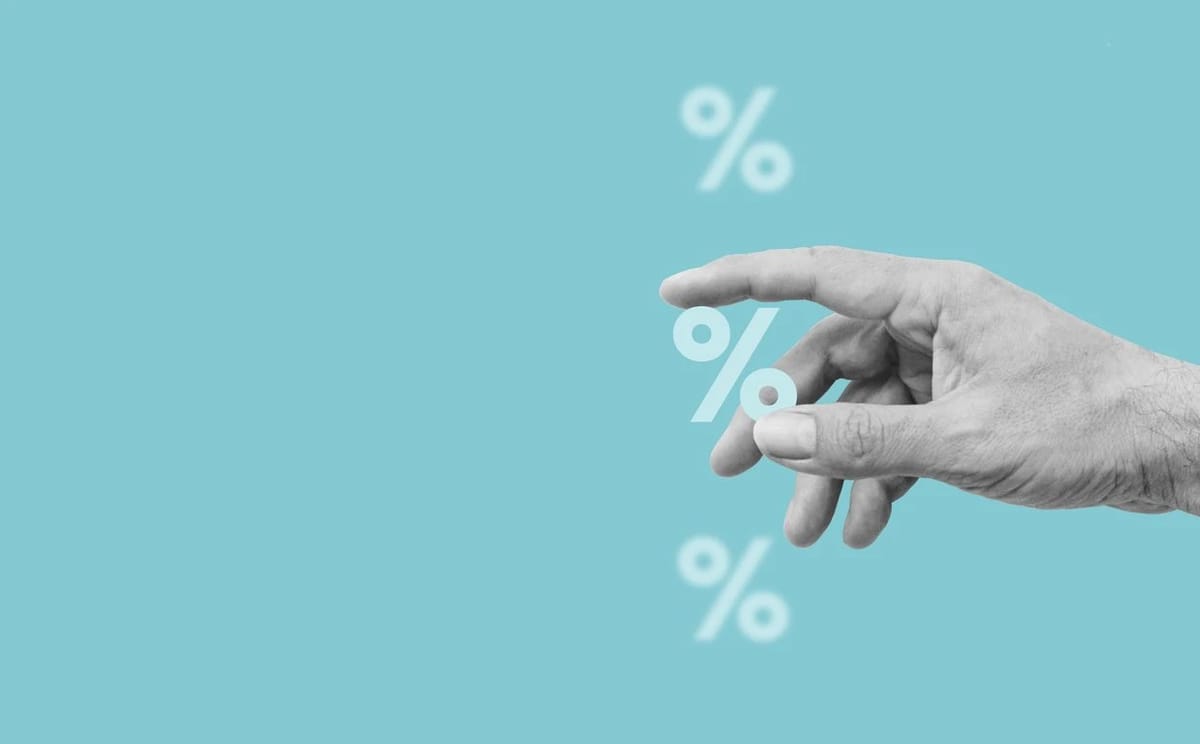 Hand reaching towards percentage signs