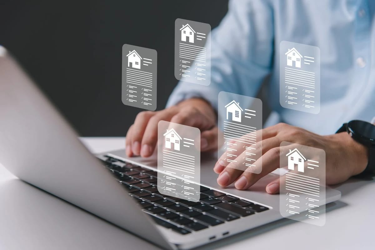 Real estate documents on a laptop screen.