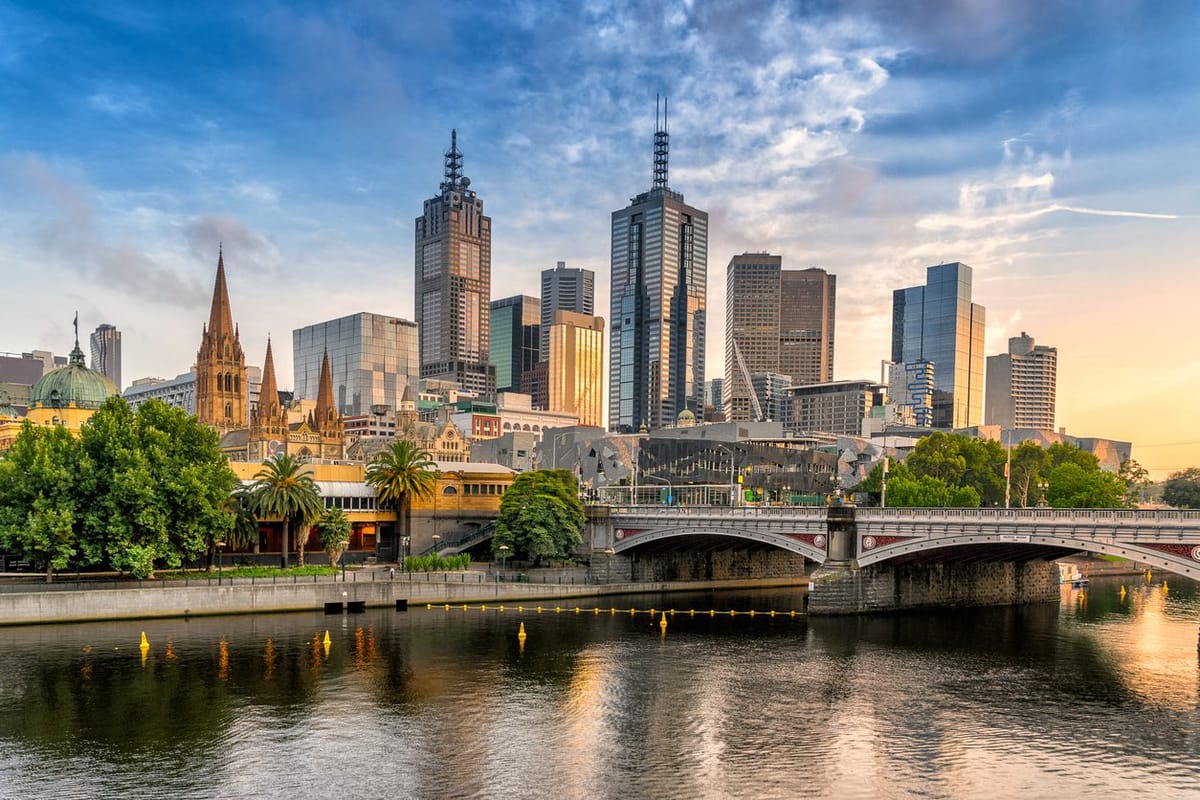 Melbourne skyline across the Yarra River at sunset