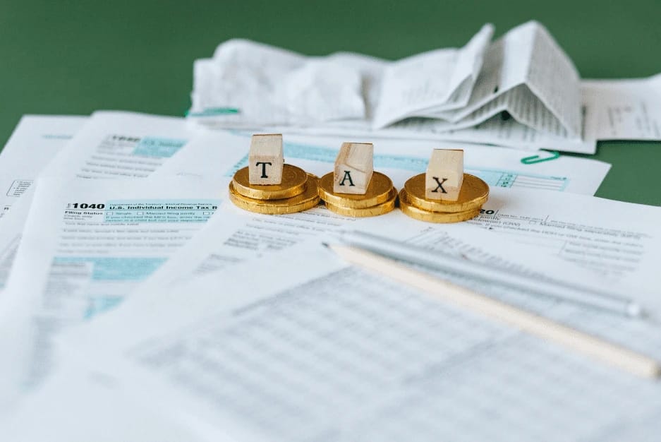 TAX blocks on coins with tax forms