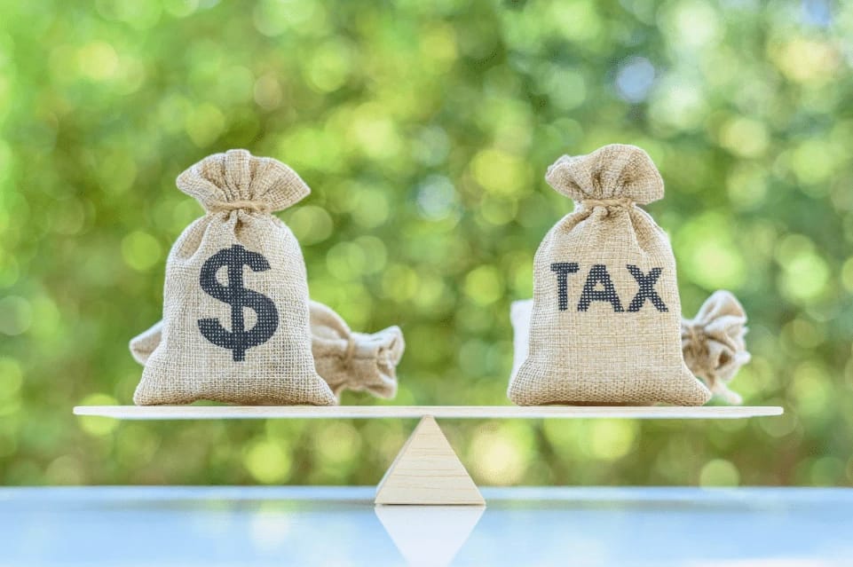 Bags labeled dollar and tax on scales.