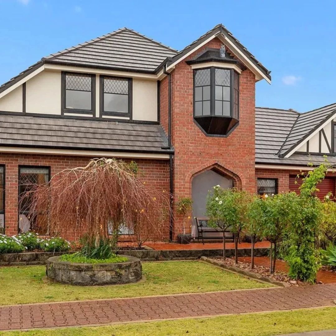 Two-storey Tudor-style brick investment home with a landscaped garden in Adelaide, South Australia