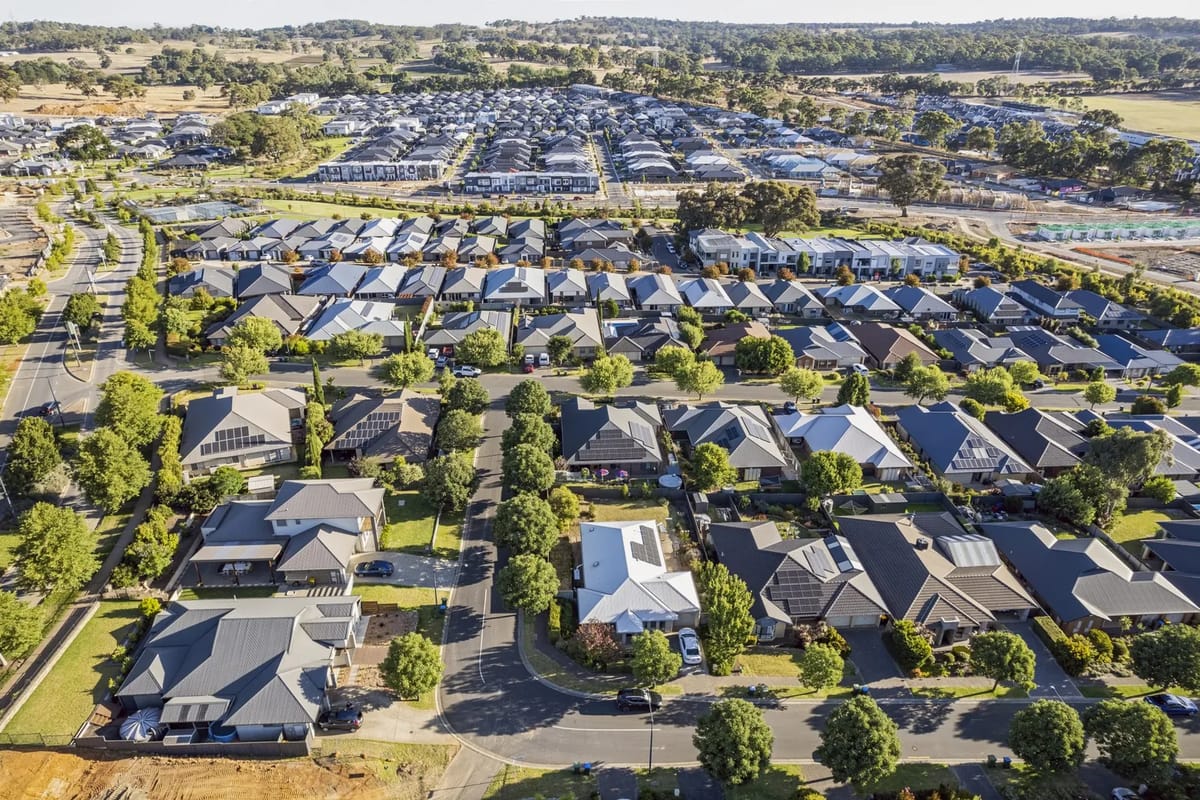 Aerial view of a suburban neighborhood with many houses.