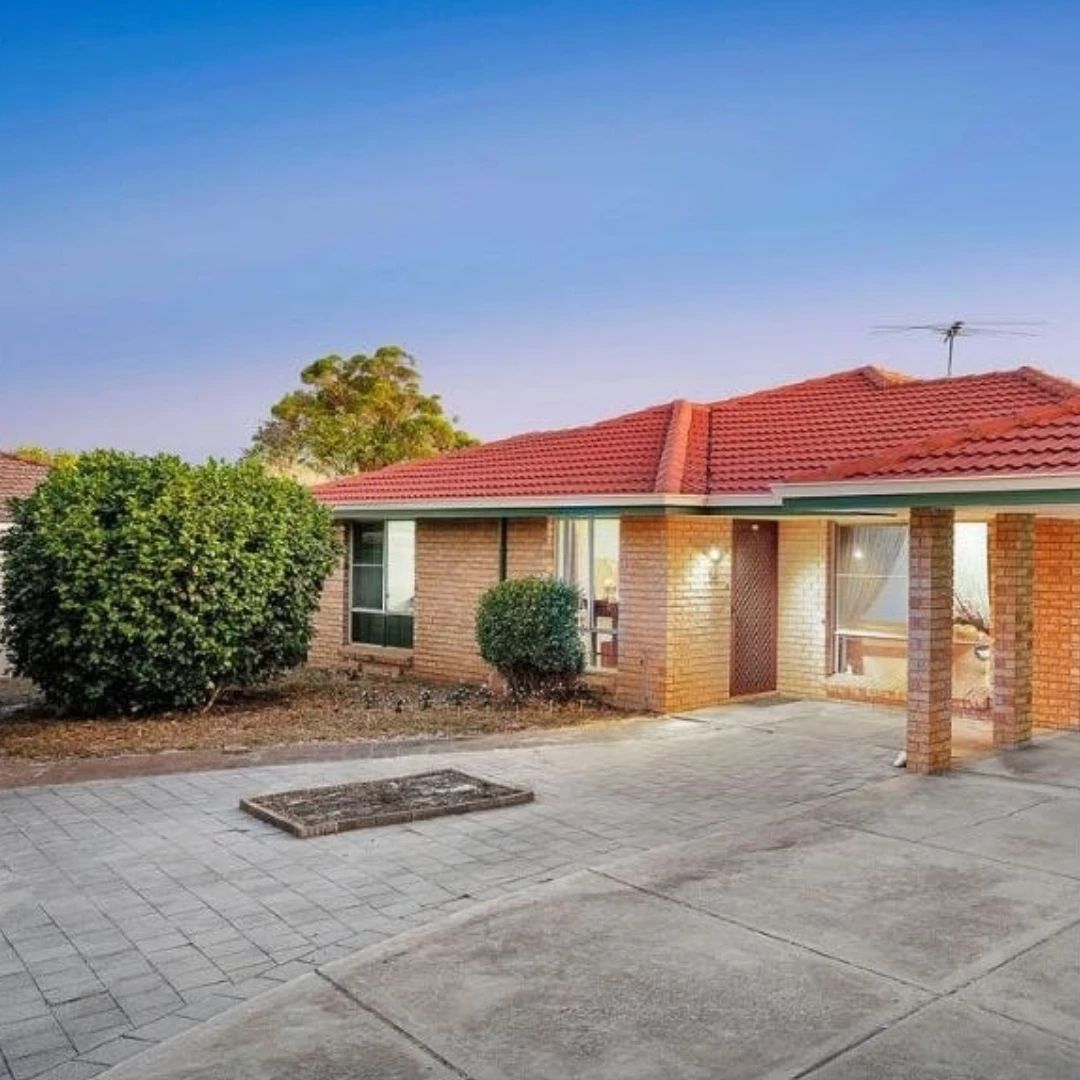 Single-storey brick investment home with a red tiled roof in Morley, Western Australia