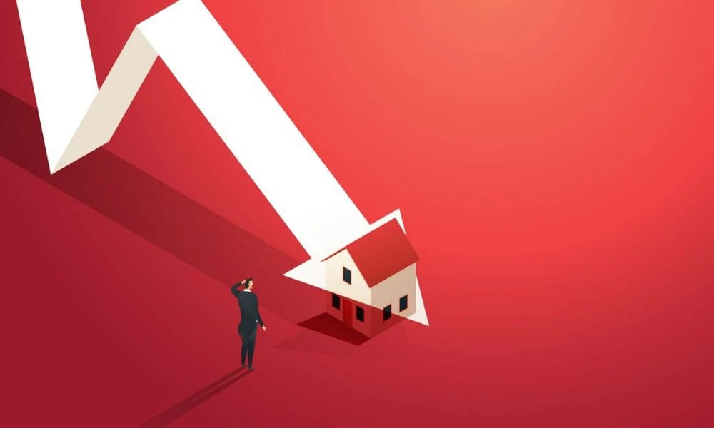 Falling house market with businessman.