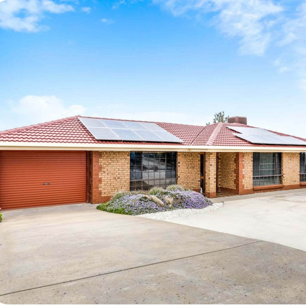 Brick house with garage, solar panels & garden