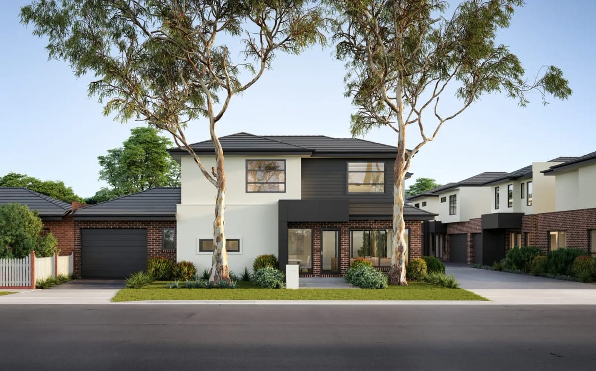 Modern strata townhouse development with trees and shared driveways