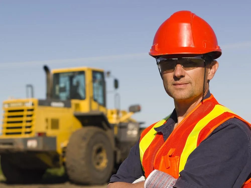 A worker in mining safety gear, used to illustrate the publisher's FIFO feature