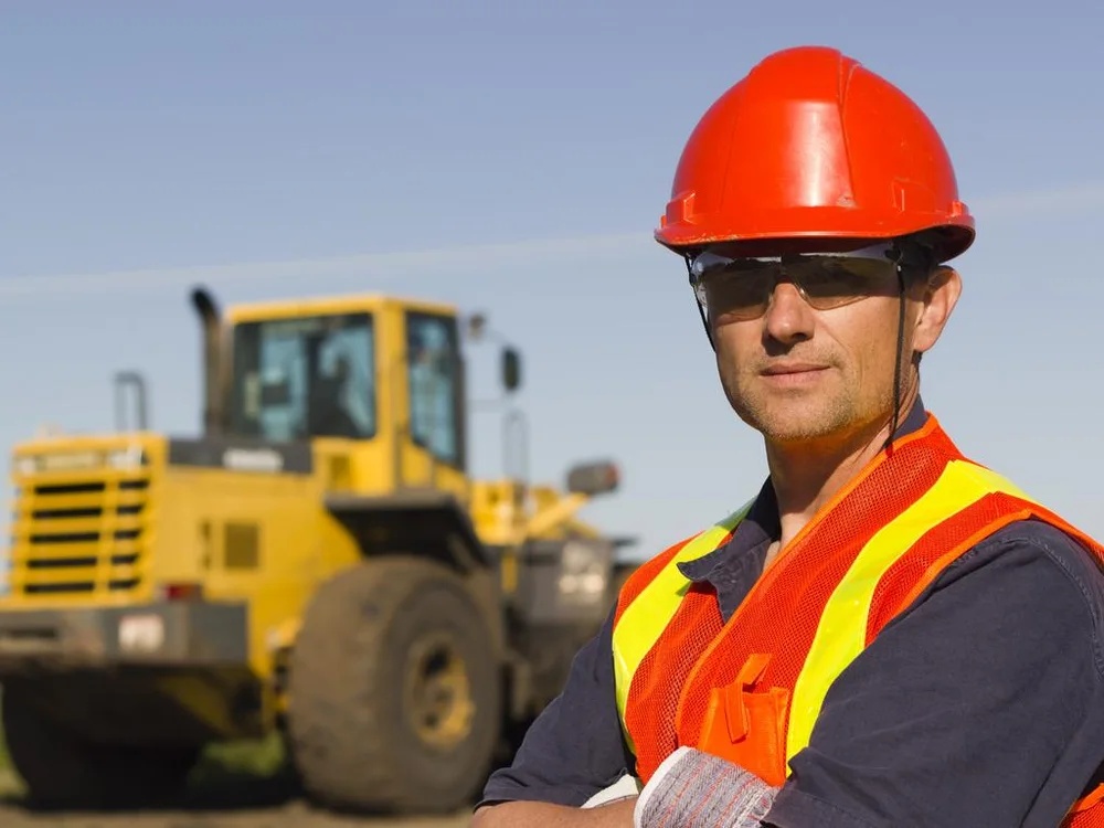 A worker in mining safety gear, used to illustrate the publisher's FIFO feature