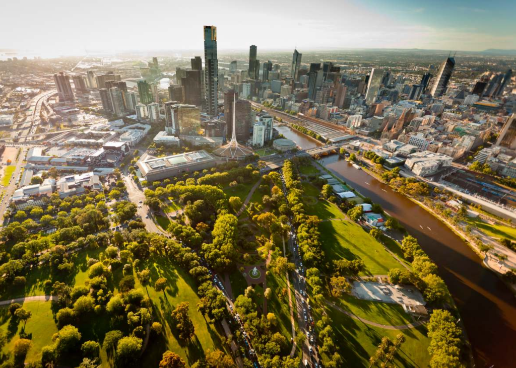 a city with a river and trees