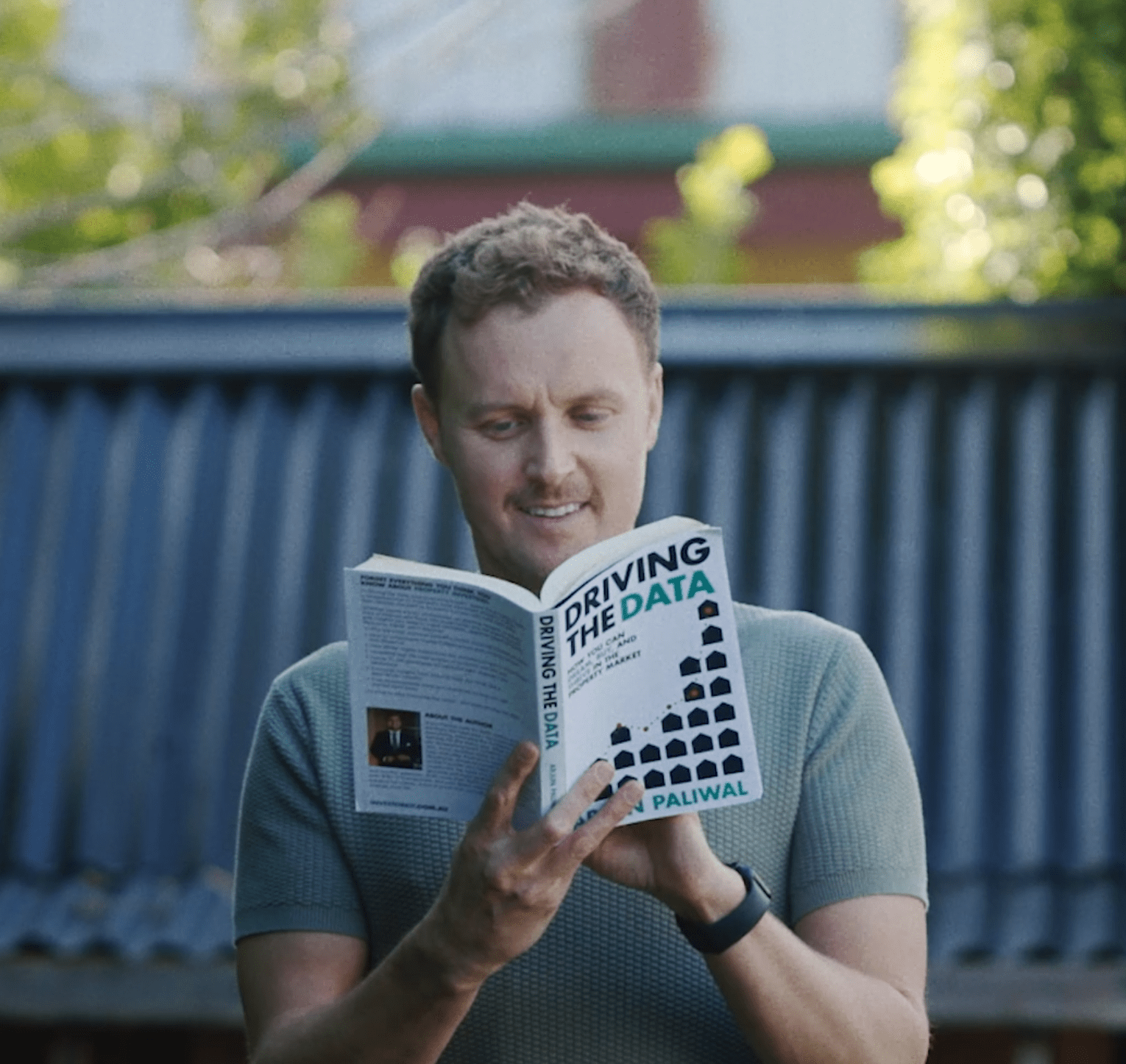 Screenshot 2025-10-14 at 3.15.26 pm Man reading Driving the Data Book